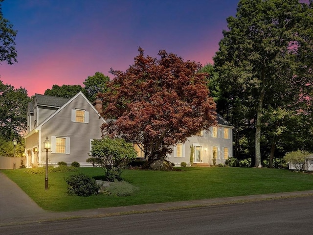 15 Wenlock Cir, Easton, MA 02356 - view of front facade with a front yard and a chimney