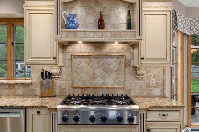 15 Wenlock Cir, Easton, MA 02356 - kitchen with cream cabinets, stainless steel appliances, decorative backsplash, and light stone counters