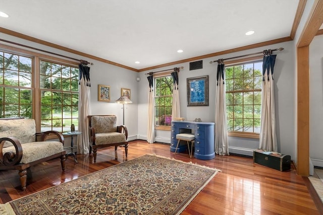 15 Wenlock Cir, Easton, MA 02356 - living area featuring plenty of natural light, crown molding, hardwood / wood-style floors, baseboards, and recessed lighting