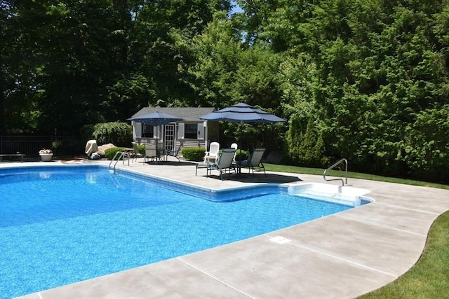 15 Wenlock Cir, Easton, MA 02356 - view of swimming pool with a patio and an outdoor structure