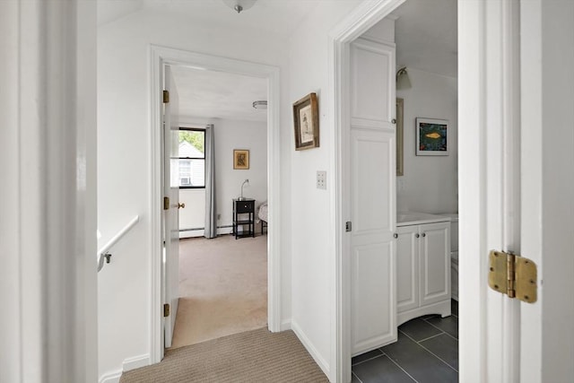 58 Edward Rd, Watertown, MA 02472 - hallway featuring dark carpet and baseboards