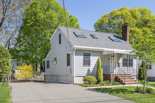 58 Edward Rd, Watertown, MA 02472 - bungalow with a chimney, roof with shingles, and a gate