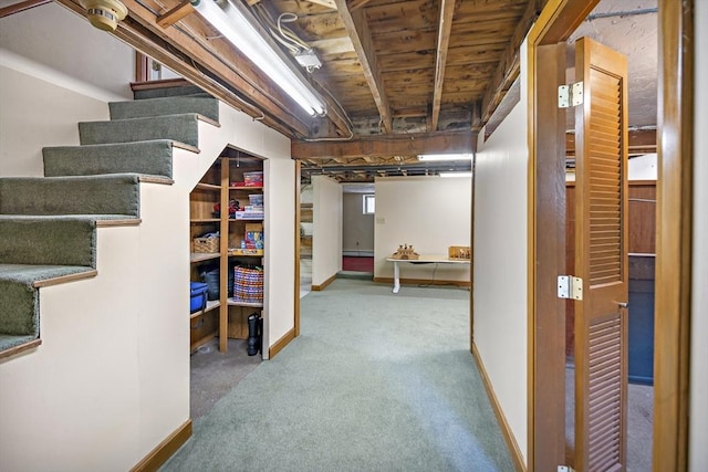 58 Edward Rd, Watertown, MA 02472 - finished basement featuring stairs, carpet floors, and baseboards
