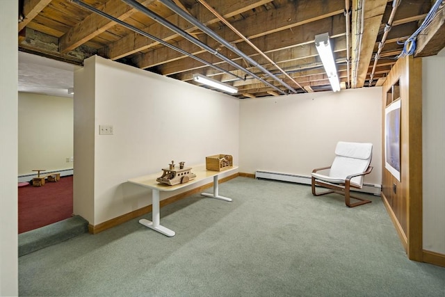 58 Edward Rd, Watertown, MA 02472 - finished below grade area featuring carpet floors, baseboards, and a baseboard heating unit