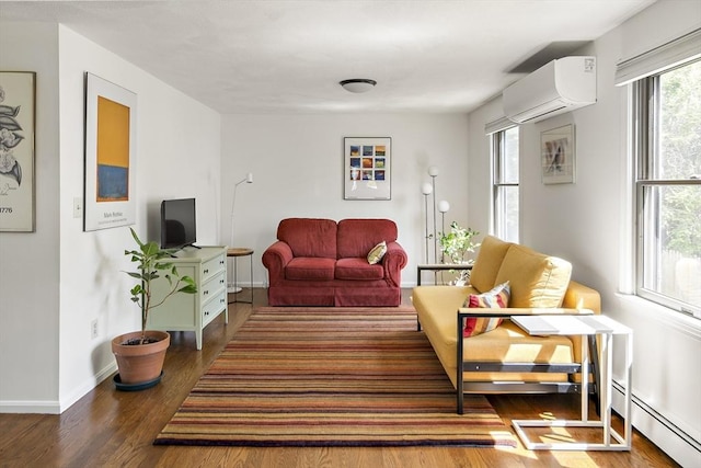 58 Edward Rd, Watertown, MA 02472 - living area featuring a wall mounted AC, baseboard heating, wood finished floors, and baseboards