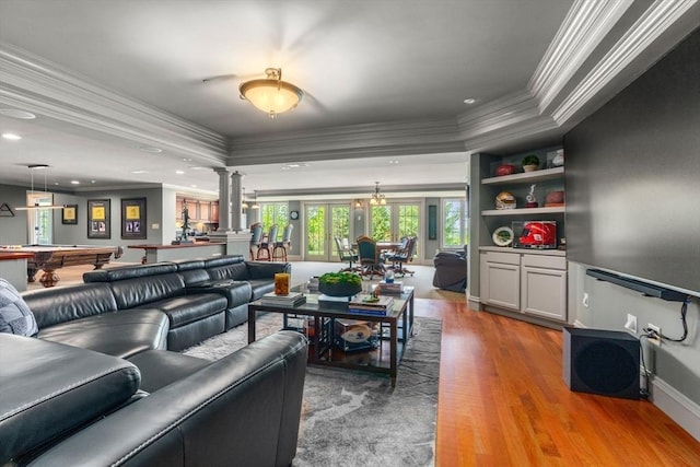 6 Wayside Cir, Framingham, MA 01701 - living room with ornamental molding, ornate columns, a raised ceiling, wood finished floors, and billiards table