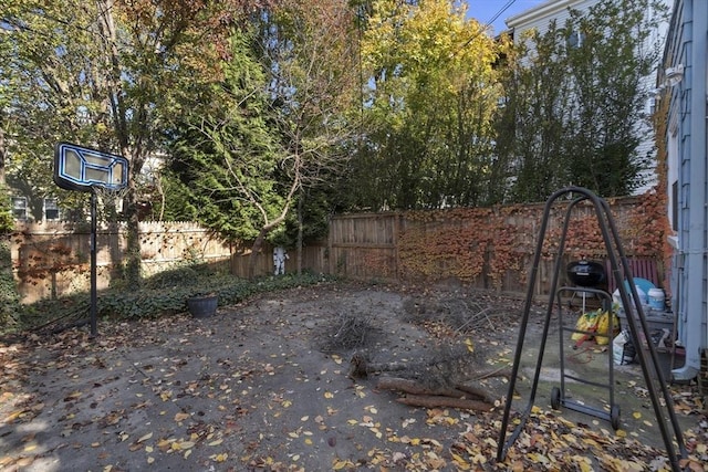 view of gate featuring fence