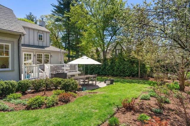 view of yard with a patio area and a deck