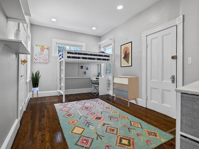 bedroom featuring recessed lighting, baseboards, and wood finished floors