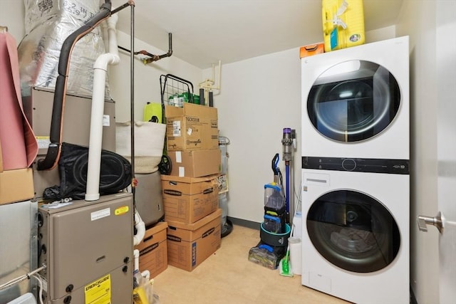 washroom with stacked washer / dryer