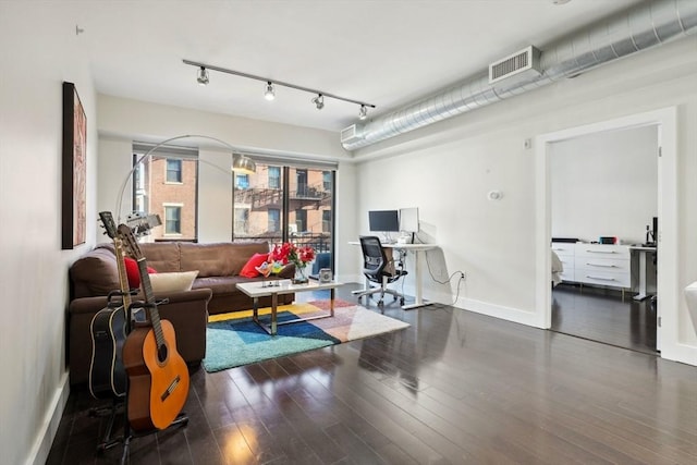 living room featuring dark hardwood / wood-style flooring