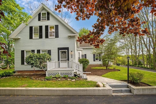 view of front of home with a front lawn