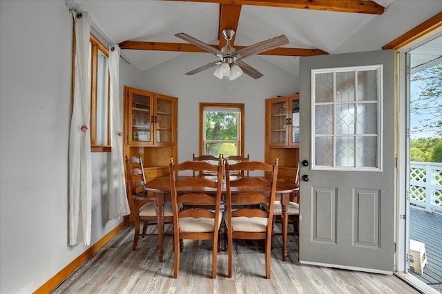 dining room with light wood-style floors, a ceiling fan, and healthy amount of natural light