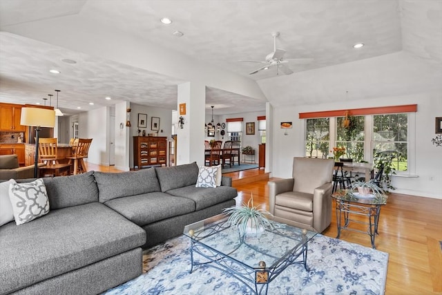10 Deer Run Dr, Westford, MA 01886 - living area featuring light wood-style flooring, a ceiling fan, baseboards, recessed lighting, and lofted ceiling