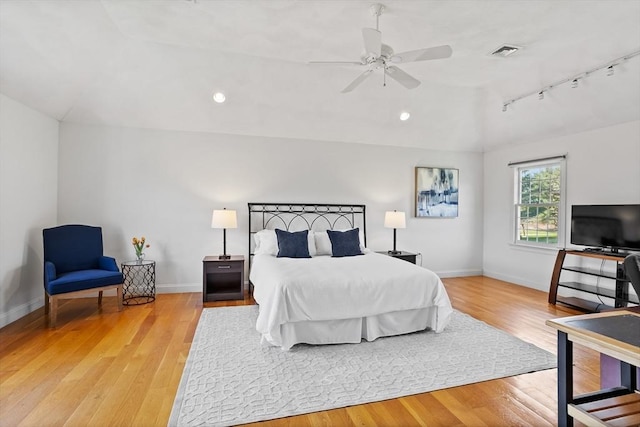 10 Deer Run Dr, Westford, MA 01886 - bedroom with baseboards, vaulted ceiling, wood finished floors, and visible vents