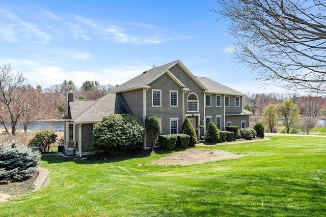 10 Deer Run Dr, Westford, MA 01886 - rear view of house featuring a yard and a chimney
