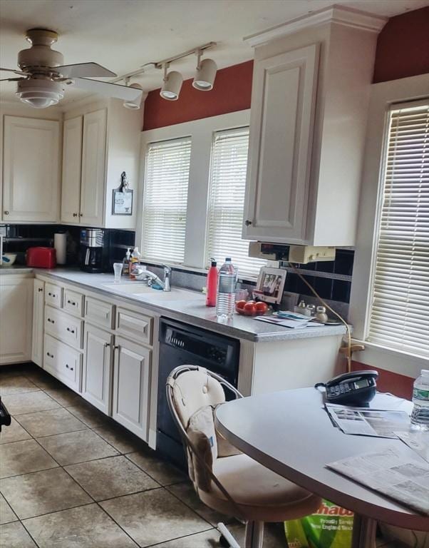 54 Hawthorn St, New Bedford, MA 02740 - kitchen featuring a ceiling fan, washer / clothes dryer, a sink, light tile patterned floors, and white cabinets
