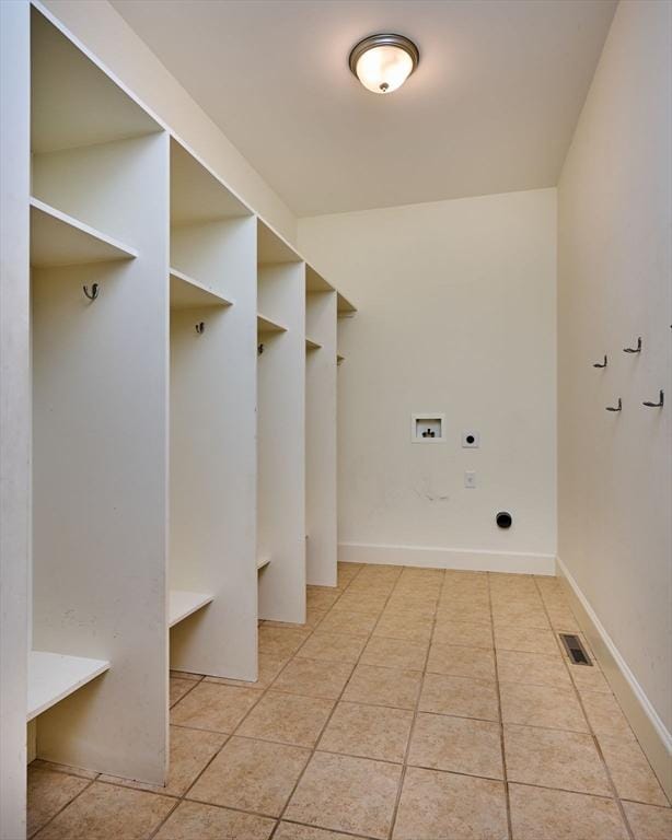 mudroom featuring light tile patterned floors