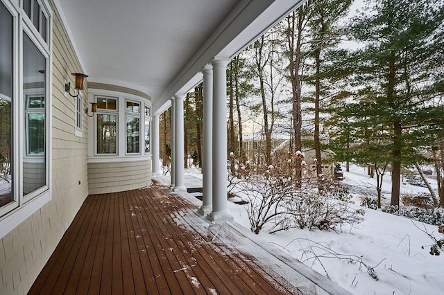 view of snow covered deck