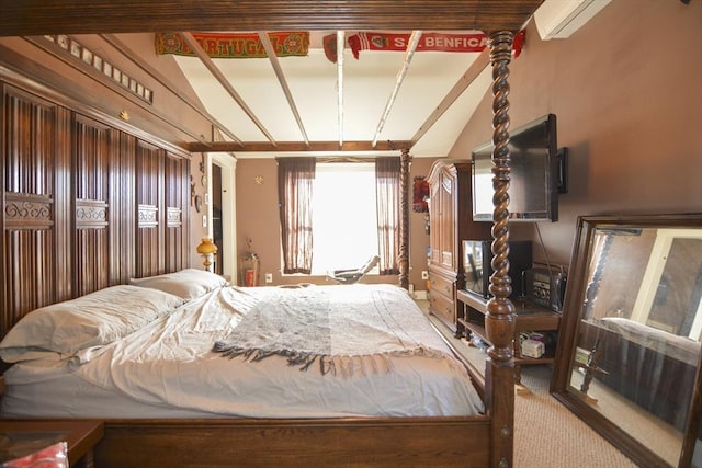 bedroom with vaulted ceiling and carpet