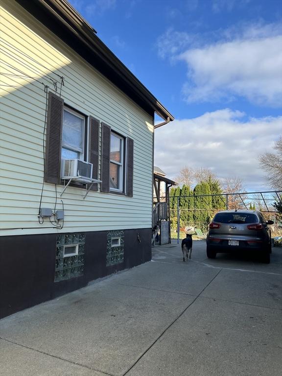 view of home's exterior featuring cooling unit