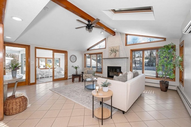 tiled living room featuring a fireplace, a skylight, beamed ceiling, a baseboard radiator, and ceiling fan