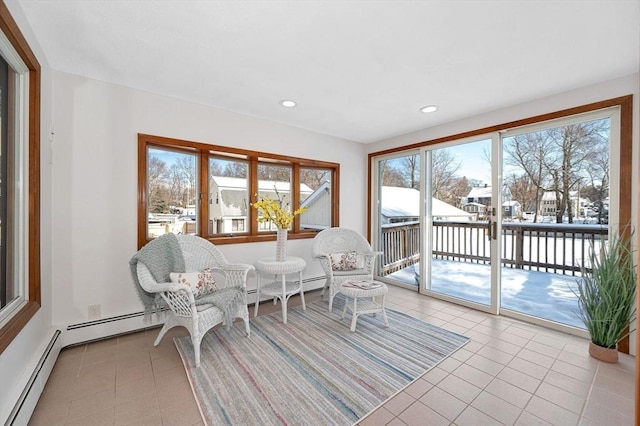 sunroom with a baseboard radiator