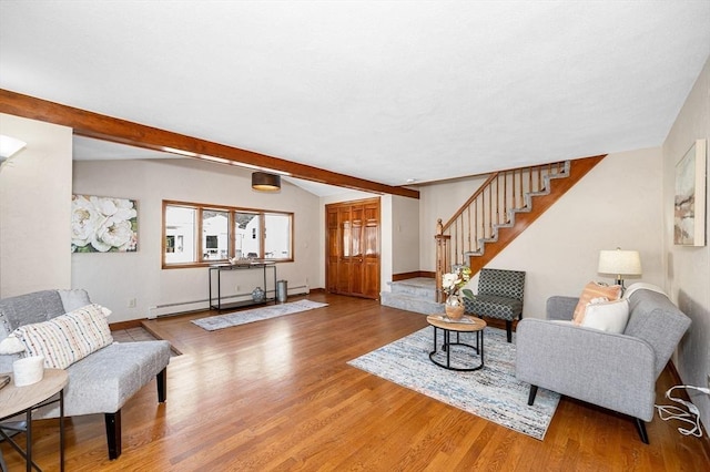 living room featuring hardwood / wood-style flooring, a baseboard radiator, and lofted ceiling with beams