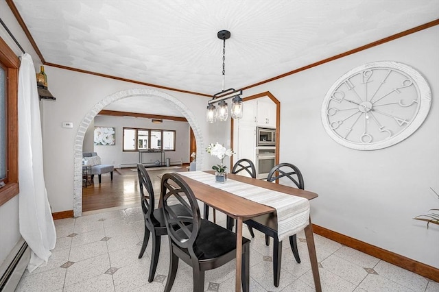 dining space featuring ornamental molding and a baseboard heating unit