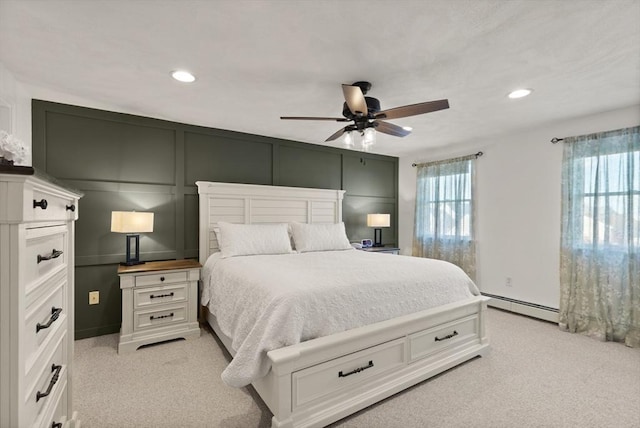 36 Emerald Dr, Lynn, MA 01094 - bedroom with baseboard heating, multiple windows, a decorative wall, recessed lighting, and a ceiling fan