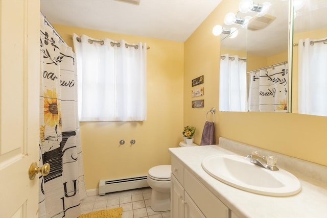 36 Emerald Dr, Lynn, MA 01094 - bathroom with baseboard heating, vanity, and tile patterned floors