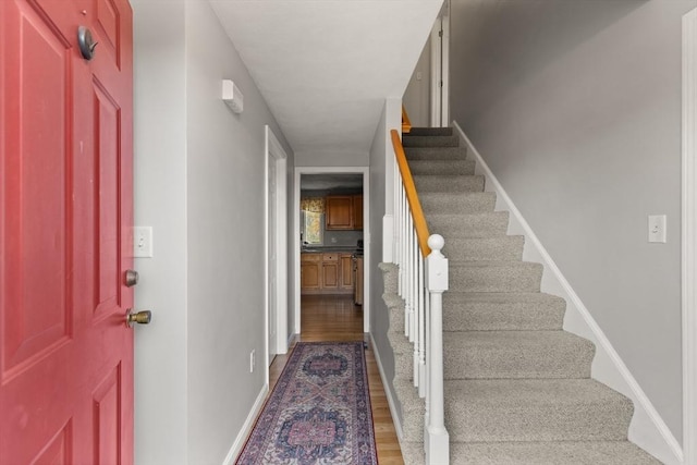 36 Emerald Dr, Lynn, MA 01094 - entryway featuring stairs and dark wood-style flooring