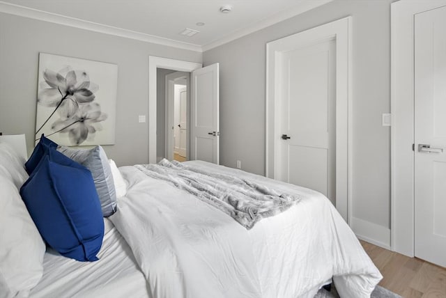 54 Stone Rd, Sudbury, MA 01776 - bedroom featuring light wood-type flooring and ornamental molding