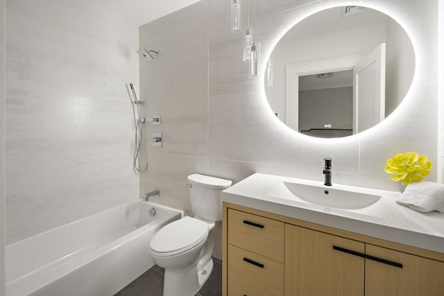 54 Stone Rd, Sudbury, MA 01776 - full bathroom featuring vanity, bathing tub / shower combination, toilet, and tile walls