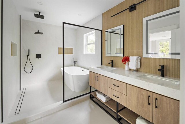54 Stone Rd, Sudbury, MA 01776 - full bath featuring a walk in shower, a freestanding tub, and double vanity
