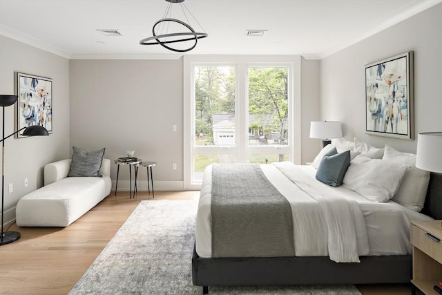 54 Stone Rd, Sudbury, MA 01776 - bedroom featuring light wood-style flooring, crown molding, and baseboards