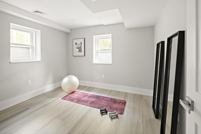 54 Stone Rd, Sudbury, MA 01776 - workout room with wood finished floors, plenty of natural light, and baseboards