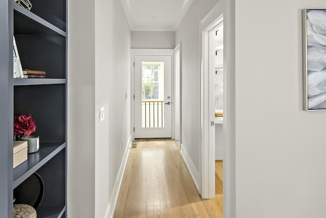 54 Stone Rd, Sudbury, MA 01776 - corridor with light wood-style floors, baseboards, and crown molding