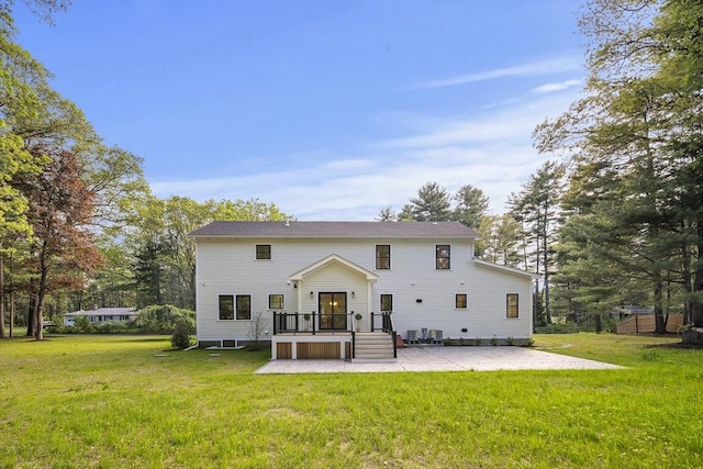 54 Stone Rd, Sudbury, MA 01776 - back of house with a patio area, a yard, and a deck