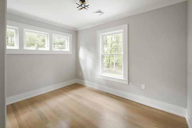 54 Stone Rd, Sudbury, MA 01776 - unfurnished room featuring ornamental molding, light wood-style floors, and baseboards