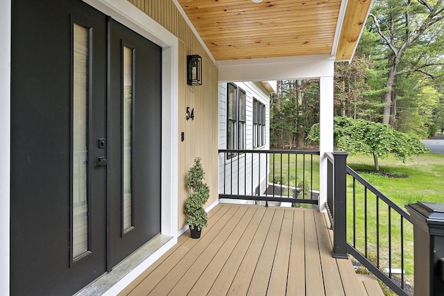 54 Stone Rd, Sudbury, MA 01776 - porch featuring a lawn