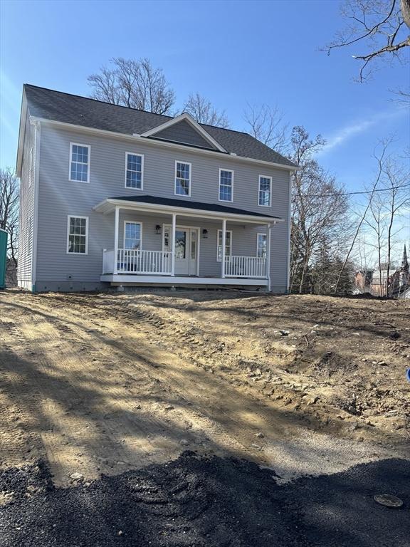 261/2 Cherry St, Spencer, MA 01562 - colonial-style house featuring covered porch