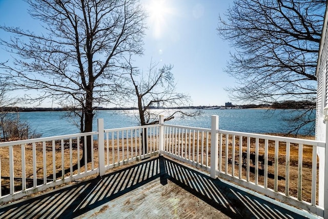 deck featuring a water view