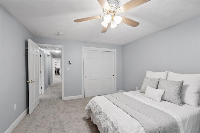 1 Sheffield Cir, Andover, MA 01810 - bedroom with light carpet, a closet, and ceiling fan