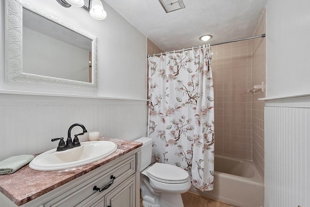 1 Sheffield Cir, Andover, MA 01810 - full bathroom featuring vanity, a wainscoted wall, and shower / bath combination with curtain