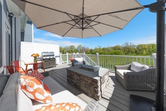 21 Brand Blvd Unit 21, Scituate, MA 02066 - deck with grilling area and an outdoor living space with a fire pit