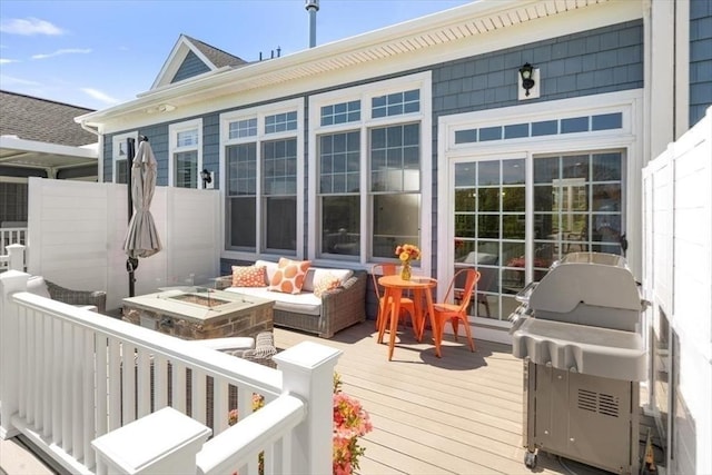 21 Brand Blvd Unit 21, Scituate, MA 02066 - wooden terrace featuring an outdoor living space with a fire pit