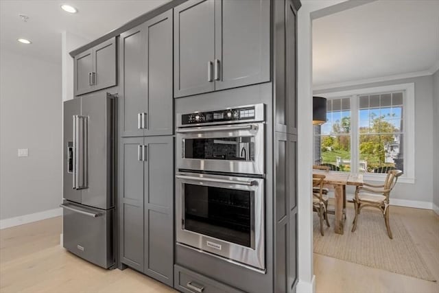 21 Brand Blvd Unit 21, Scituate, MA 02066 - kitchen with stainless steel appliances, baseboards, ornamental molding, recessed lighting, and gray cabinetry