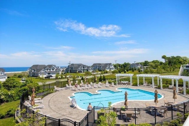 21 Brand Blvd Unit 21, Scituate, MA 02066 - community pool with a pergola, fence, a patio, and a residential view