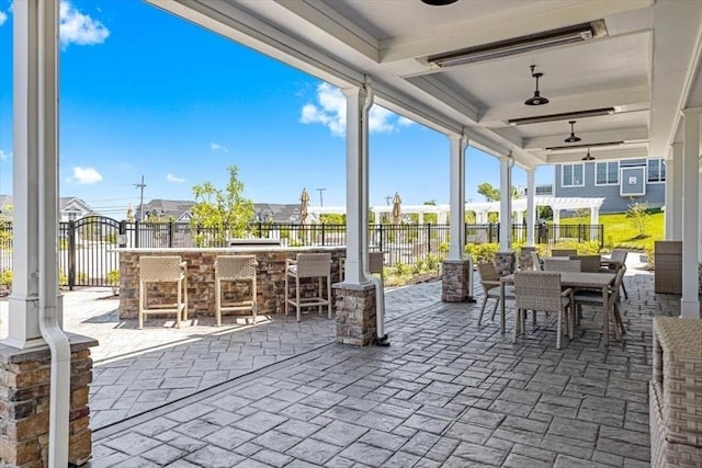 21 Brand Blvd Unit 21, Scituate, MA 02066 - view of patio / terrace with fence, ceiling fan, and outdoor dining space